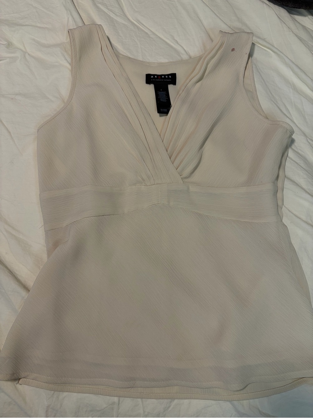 Axcess Ivory Sleeveless V-Neck Peplum Blouse